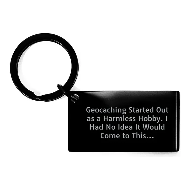 Black keychain that says Geocaching started out as a harmless hobby